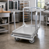 Thumbnail image #2 for John Boos Single-Stack Aluminum Bun Pan Truck/Dolly with Push Handle and 5-Inch Swivel Casters