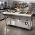 Thumbnail image #2 for Advance Tabco Triumph Supreme 4-Well Electric Hot Food Table with Undershelf and Cutting Board