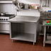 Thumbnail image #2 for Advance Tabco 72 Inch x 24 Inch Stainless Steel Work Table with Open Front Cabinet Base and 1-1/2 Inch Rear Up-Turn