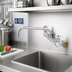 Thumbnail image #2 for T&S Brass Big-Flo 8-Inch Wall-Mount Sink Mixing Faucet with 12-Inch Swing Nozzle and Anti-Microbial 4-Arm Handles