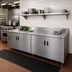 Thumbnail image #2 for Advance Tabco Special Value Economy Enclosed Work Table with Cabinet Base, 96 x 24 Inches, 304 Stainless Steel Top, 5 Inch Backsplash
