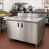 Thumbnail image #2 for Advance Tabco Special Value Economy 72-Inch x 30-Inch Enclosed Work Table with Sliding Door Cabinet Base, 16-Gauge 304 Stainless Steel Top, and 5-Inch Backsplash