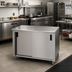 Thumbnail image #2 for Advance Tabco Special Value Series Economy Enclosed Work Table with Sliding Doors, 48 x 24 Inch, 16-Gauge 304 Stainless Steel Top