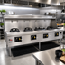 Thumbnail image #2 for York Four-Chamber Gas Wok Range with Water-Cooled Top and Stainless Steel Deck and Sides
