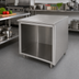 Thumbnail image #2 for Advance Tabco 48 Inch x 30 Inch Work Table with Open Front Cabinet Base and 304 Stainless Steel Top