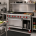 Thumbnail image #2 for American Range 48-Inch Green Flame Commercial Gas Range with 12-Inch Griddle, 6 Open Burners, Left Convection Oven, and Right Storage Base