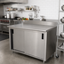 Thumbnail image #2 for Advance Tabco 84-Inch x 30-Inch Enclosed Work Table with Cabinet Base, Sliding Doors, and 5-Inch Backsplash