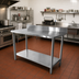 Thumbnail image #2 for Thunder Group 84-Inch x 30-Inch 18-Gauge 430 Stainless Steel Flat Top Work Table with 4-Inch Backsplash and Galvanized Undershelf