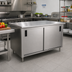 Thumbnail image #2 for Advance Tabco Special Value Series 60 Inch x 30 Inch Enclosed Work Table with Cabinet Base, Sliding Doors, and 16-Gauge 304 Stainless Steel Top