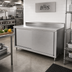 Thumbnail image #2 for John Boos Enclosed Work Table with Sliding Doors, 72W x 24D, 16-Gauge Stainless Steel Top, 5-Inch Backsplash