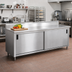 Thumbnail image #2 for Advance Tabco Enclosed Stainless Steel Work Table with Cabinet Base, Mid-Shelf and Sliding Doors, 14-Gauge 304 Stainless Steel Top, 144 x 36 Inches