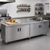 Thumbnail image #2 for Advance Tabco Special Value Series Enclosed Work Table with Cabinet Base, Mid-Shelf and Hinged Doors, 120
