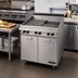 Thumbnail image #2 for Garland Master Series Floor Model Gas Charbroiler with Storage Base, 17 x 23 Inch Grill Area, Briquettes, and Reversible Flat/Tilt Grates