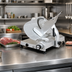Thumbnail image #2 for Omas Trento 12-Inch Heavy-Duty Gear-Driven Manual Gravity Feed Meat Slicer