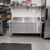 Thumbnail image #2 for Omcan USA 48-Inch x 30-Inch Stainless Steel Enclosed Work Table with Cabinet Base, Sliding Doors, and 4-Inch Backsplash