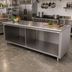 Thumbnail image #2 for Advance Tabco Underbar Work Table, 120-Inch W x 30-Inch D, Open Front Cabinet Base, 14-Gauge 304 Stainless Steel Top