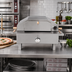 Thumbnail image #3 for Omcan 1-Deck Countertop Propane Gas Pizza Oven with Foldable Legs and Pizza Stone