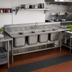 Thumbnail image #2 for Advance Tabco Regaline 4-Compartment Floor Model Sink with Right-Hand Drainboard, 20