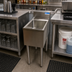 Thumbnail image #3 for BK Resources 12 Inch Wide One-Compartment Underbar Dump Sink with 10 x 14 x 6 Inch Bowl and 4 Inch Backsplash