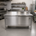 Thumbnail image #2 for John Boos Enclosed Stainless Steel Work Table with Sliding Doors, 132