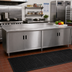 Thumbnail image #2 for Advance Tabco Special Value Series 84-Inch x 24-Inch Economy Enclosed Work Table with Cabinet Base, Hinged Doors, 16-Gauge 304 Stainless Steel Top, and 5-Inch Backsplash