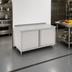 Thumbnail image #2 for 48 Inch x 24 Inch Cabinet Base Work Table with Hinged Doors, 16-Gauge Stainless Steel Top, and 1-1/2 Inch Rear Riser