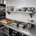 Thumbnail image #2 for Advance Tabco 132-Inch x 12-Inch Wall-Mounted 430 Stainless Steel Shelf, 18 Gauge, Satin Finish, Bullnose Edge