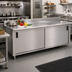 Thumbnail image #2 for Advance Tabco Special Value Series 120-Inch x 24-Inch Stainless Steel Enclosed Work Table with Cabinet Base, Mid-Shelf, Sliding Doors, and 5-Inch Backsplash