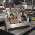 Thumbnail image #2 for Advance Tabco Underbar Basics™ Heavy-Duty Double-Tier Stainless Steel Speed Rail, 48 Inch, 26-28 Bottle Capacity