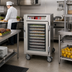 Thumbnail image #2 for Metro C5 6 Series Mobile Half-Height Pass-Thru Heated Holding Cabinet with 1 Tempered Double-Pane Glass Door and 1 Solid Door, 120V