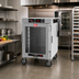 Thumbnail image #3 for Metro HotBlox™ Wide 8-Pan Pass-Thru Mobile Insulated Holding Cabinet, Clear Front Door and Solid Rear Door, Analog, 120V