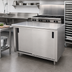 Thumbnail image #2 for Advance Tabco Special Value Economy Enclosed Work Table with Sliding Doors, 84 x 24, 16-Gauge 304 Stainless Steel Top