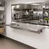 Thumbnail image #2 for BK Resources Stainless Steel Pass-Through Shelf, 96 Inch W x 18 Inch D, 5 Inch Max Wall Thickness