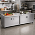 Thumbnail image #2 for Advance Tabco Special Value Series 84 Inch x 24 Inch Enclosed Work Table with Cabinet Base and Hinged Doors, 16 Gauge 304 Stainless Steel Top