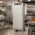 Thumbnail image #2 for Metro C5 6 Series Mobile Full-Height Pass-Thru Heated Holding Cabinet with Solid Doors and Universal Slides