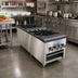Thumbnail image #2 for Comstock-Castle 18-Inch Wide Gas Stock Pot Range with 2 Double Burner Sections and Open Front Cabinet Base