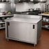 Thumbnail image #2 for Advance Tabco Enclosed Work Table with Cabinet Base and Sliding Doors, 48 x 36 Inches, 14-Gauge 304 Stainless Steel Top, 5-Inch Backsplash