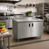 Thumbnail image #2 for Advance Tabco Enclosed Work Table with Cabinet Base, 72 x 36 Inches, 14 Gauge 304 Stainless Steel Top
