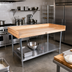 Thumbnail image #2 for John Boos 60 Inch x 36 Inch Bakers' Table with 1-3/4 Inch Maple Top, Stainless Steel Undershelf, and Coved Riser