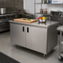 Thumbnail image #2 for Advance Tabco Special Value Series Economy Enclosed Work Table with Cabinet Base, Mid-Shelf and Hinged Doors, 60 x 24 Inches, 16-Gauge 304 Stainless Steel Top