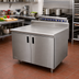 Thumbnail image #2 for Advance Tabco Enclosed Stainless Steel Work Table with Cabinet Base, Mid-Shelf, Hinged Doors, and 5-Inch Backsplash