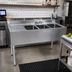 Thumbnail image #2 for BK Resources Three-Compartment Underbar Sink with Left Drainboard, Faucet, and Backsplash