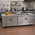 Thumbnail image #2 for Advance Tabco Special Value Economy Enclosed Work Table with Cabinet Base, 96 x 30 Inch, 16 Gauge 304 Stainless Steel Top