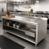 Thumbnail image #2 for Advance Tabco 144-Inch W x 24-Inch D Stainless Steel Work Table with Open Front Cabinet Base, Fixed Mid-Shelf, and 1-1/2-Inch Rear Up-Turn