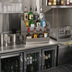 Thumbnail image #3 for BK Resources 12-Inch Wide x 18-1/4-Inch Deep Freestanding 4-Step Underbar Liquor Bottle Display, Stainless Steel, 13-Bottle Capacity