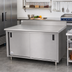 Thumbnail image #2 for Advance Tabco Special Value Series 120 x 30 Inches Enclosed Work Table with Cabinet Base, Mid-Shelf and Sliding Doors