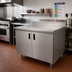 Thumbnail image #2 for Advance Tabco Special Value Economy Enclosed Stainless Steel Work Table with Sliding Doors and 5-Inch Backsplash