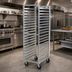 Thumbnail image #2 for Carter-Hoffmann O8609W Wide-Opening Side-Loading Fixed Angle Pan Rack for 18 x 26 Trays, 9-Tray Capacity, 5-Inch Casters