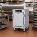 Thumbnail image #2 for Metro C5 8 Series Mobile 1/2 Height Pass-Thru Controlled Temperature Holding Cabinet with Solid Doors and Universal Wire Slides