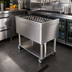 Thumbnail image #2 for Glastender Mobile Stainless Steel Bar Ice Bin with Undershelf and Drain Valve, 85 lb. Capacity